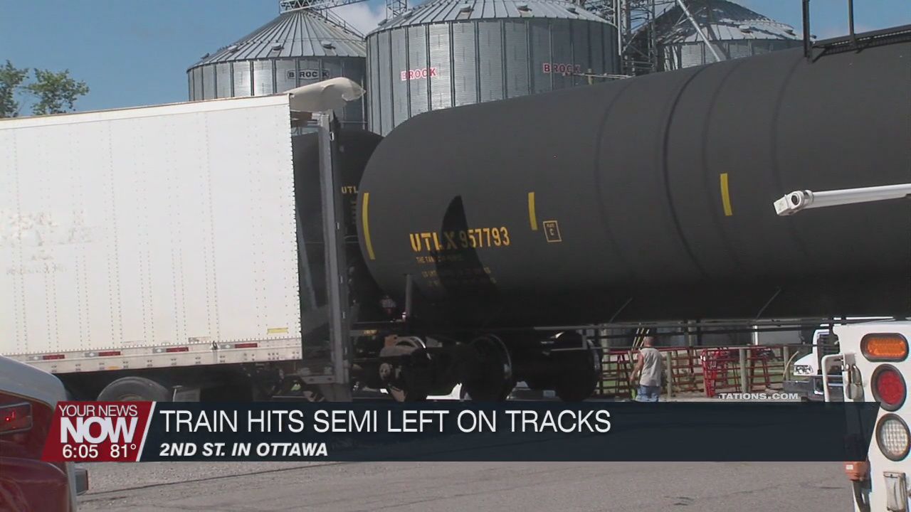 Train crashes into semi truck left on the tracks